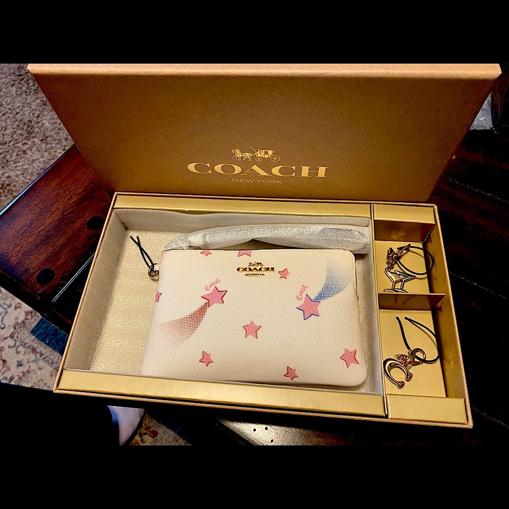 Coach Boxed Corner Zip Wristlet With Disco Star Print with 2 charms!